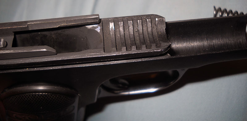 detail, barrel retention lugs in Colt 1903 frame